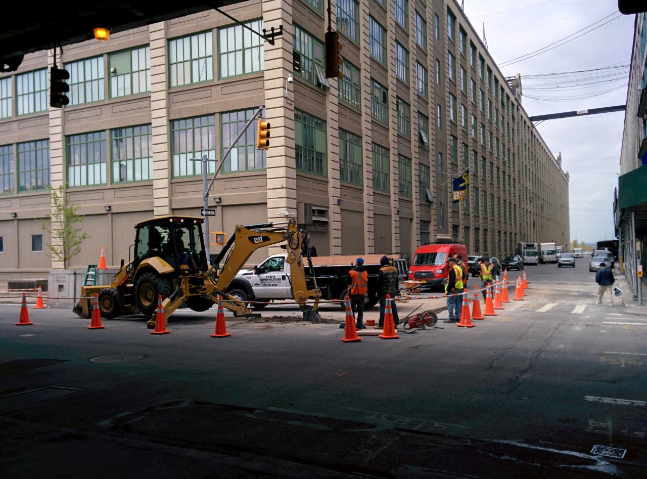 Underground conduit and access structure construction at Bush Terminal, Industry City